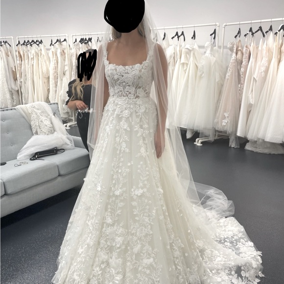 Martina Liana: ivory beaded floral A-line wedding dress with tulle train - Picture 2 of 6